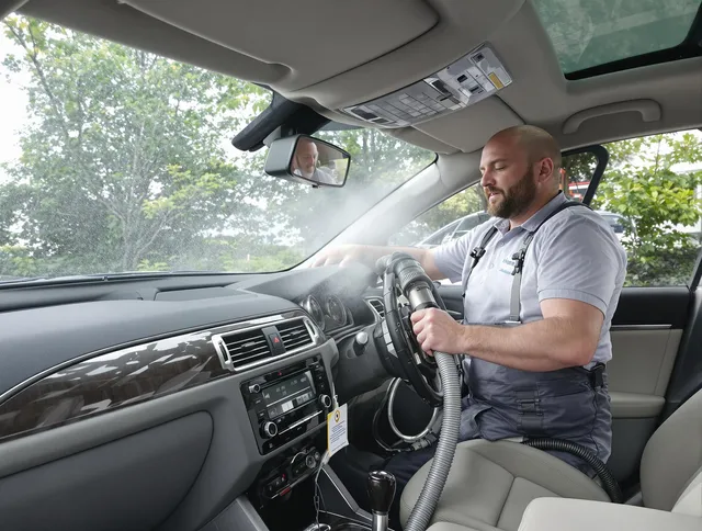 Seekonk Air Duct Cleaning specialist performing professional car duct cleaning in Seekonk
