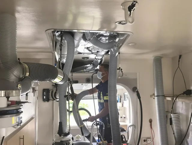 Seekonk Air Duct Cleaning specialist performing precise mobile home duct cleaning in Seekonk